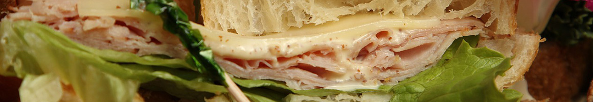 Eating Sandwich at DiBella's Subs restaurant in Washington Township, OH.